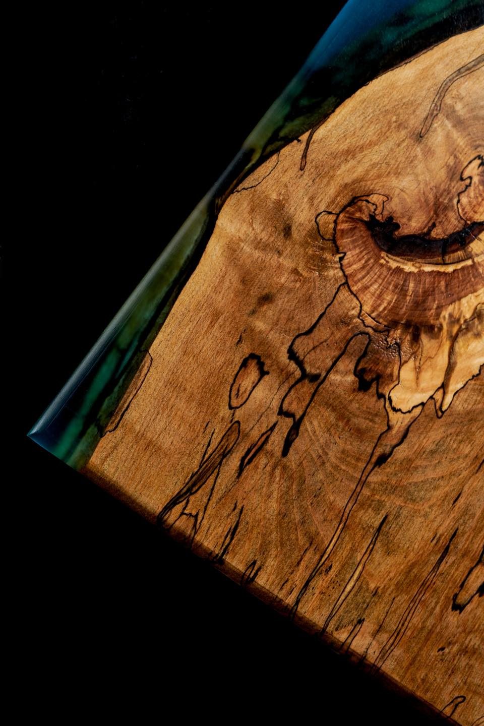 Resin river table handcrafted in Newtownabbey, Northern Ireland with natural wood grain