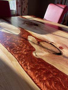 Handmade epoxy resin table in Northern Ireland interior setting